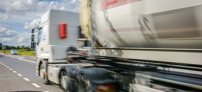 truck driving on road